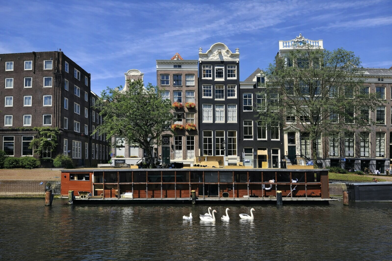 De Poezenboot floating cat sanctuary moored on an Amsterdam canal